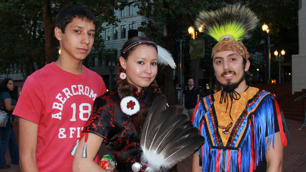 Native teens at a cultural gathering.